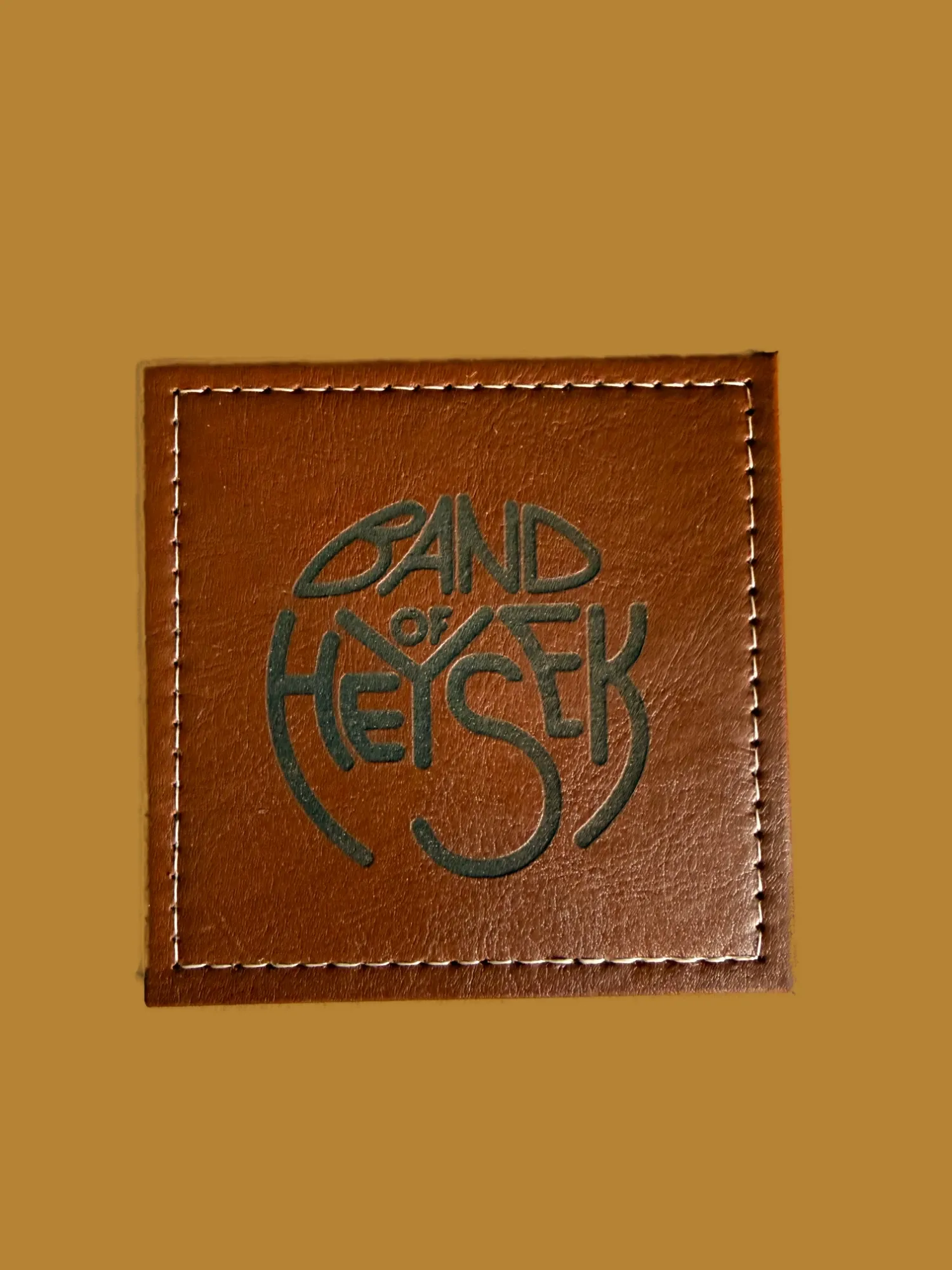 Foto produktu — Podtácek Band of Heysek
